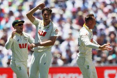 Australia39s pat cummins celebrates with teammates.jpg