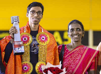 Chennai grandmaster r praggnanandhaa with his mother r nagalakshmi upon his ar.jpg