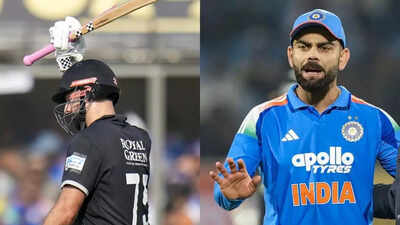 Daryl mitchell and virat kohli pti photo.jpg
