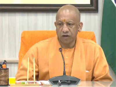 Yogi adityanath greets people on uttar pradesh day.jpg