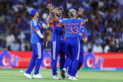 1774281494 ahmedabad mar 08 ani india39s axar patel and teammates celebrate the wicket o.jpg