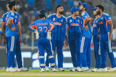 Ahmedabad feb 18 ani india39s varun chakaravarthy with his teammates celebra.jpg