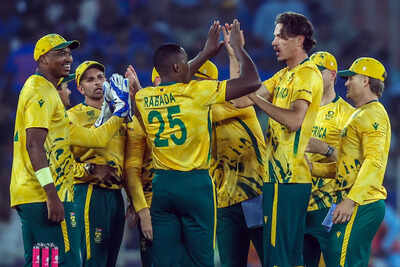 Ahmedabad feb 22 ani south africa39s marco jansen and teammates celebrate the.jpg
