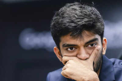 Singapore india39s d gukesh reacts during his match against ding liren of china .jpg