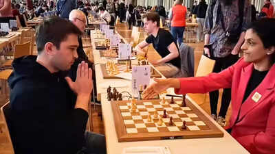 Uzbekistan gm nodirbek yakubboev comes up with 39namaste39 gesture against harika dronavalli screeng.jpeg