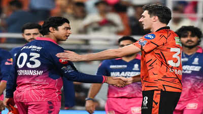 Pat cummins and vaibhav sooryavanshi.jpg