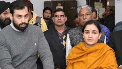 Prateek yadav with his wife aparna yadav.jpg