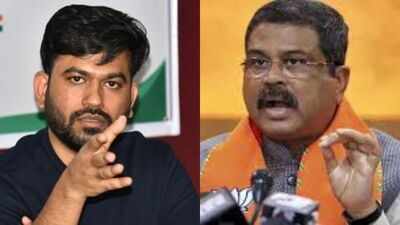 Abhijeet dipke dharmendra pradhan pti images.jpg