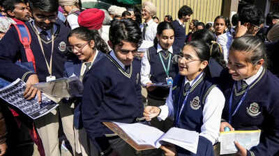 Amritsar students discuss after appearing for the first cbse board exam of 2025.jpg