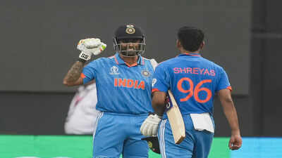 Mumbai india39s shreyas iyer being greeted by suryakumar yadav as he walks off t.jpg