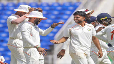 Nagpur vidarbha39s harsh dubey with teammates celebrates after taking the wicket.jpg