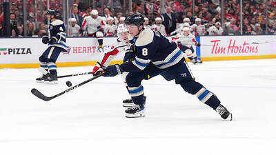 Nhl zach werenski 8 of the columbus blue jackets controls the puck during the first period against t.jpeg