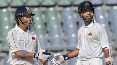 Ajinkya rahane and sachin tendulkar.jpg