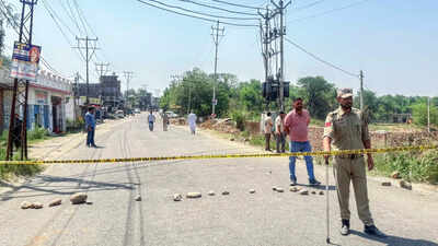 Jammu may 02 ani a jammu and kashmir police personnel stands guard at the br.jpg
