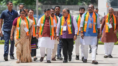 Nitin nabin with bjps new national team.jpg