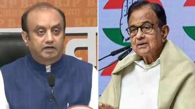 Sudhanshu trivedi p chidambaram.jpg