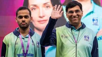 Arjun erigaisi and viswanathan anand photo by chessbase india.jpg