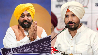 Bhagwant mann and amrinder singh warring r.jpg