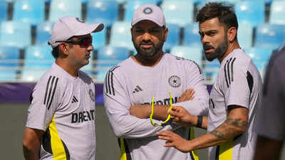 Dubai indias coach gautam gambhir skipper rohit sharma and virat kohli during.jpg