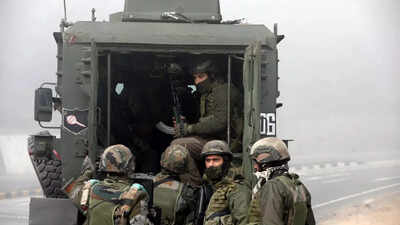 Jammu security personnel during an encounter with terrorists at the sidhra area.jpg