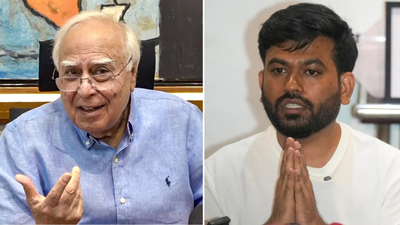 Kapil sibal and abhijeet dipke r.jpg