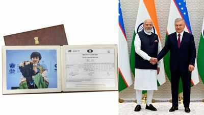 Pm modi gifting javokhir sindarovs world cup scoresheet to uzbek prez.jpg