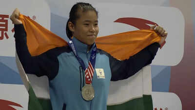 Roshibina devi assures third successive asian games medal aryan thakur loses in soft tennis.jpg