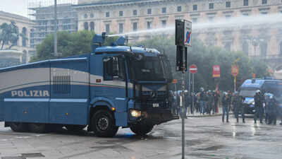 A police vehicle sprays a jet of water during a protest over the state of public services and the ri.jpeg