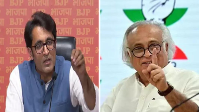 Bjp spokesperson pradeep bhandari and congress leader jairam ramesh.jpg