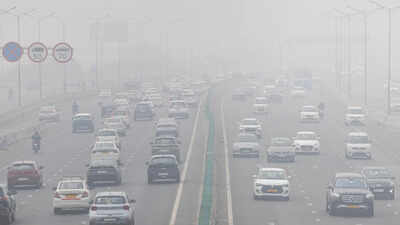 File photo traffic moves along a highway amidst air pollution in new delhi india.jpg