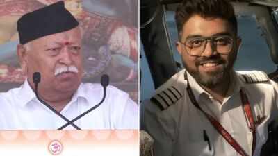 Rss chief mohan bahgwat flydubai pilot capt.jpg